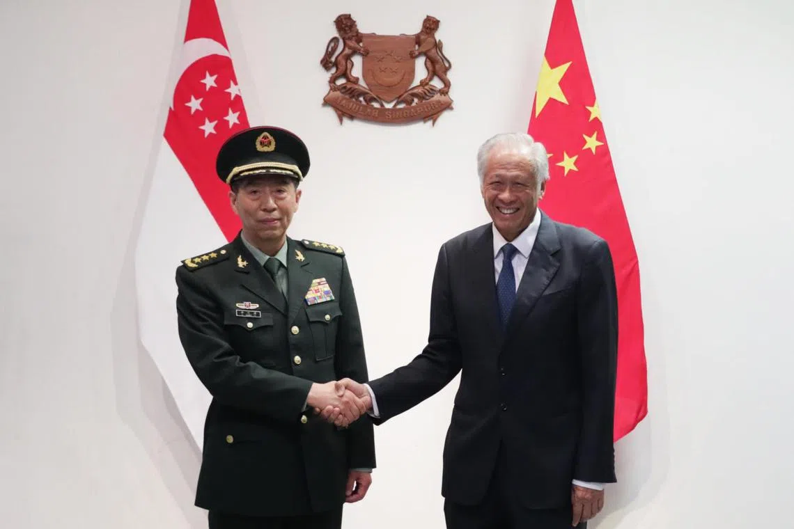 China's Defence Minister Li Shangfu (left) and Defence Minister Ng Eng Hen meet at the Mindef headquarters in Bukit Gombak on Thursday.