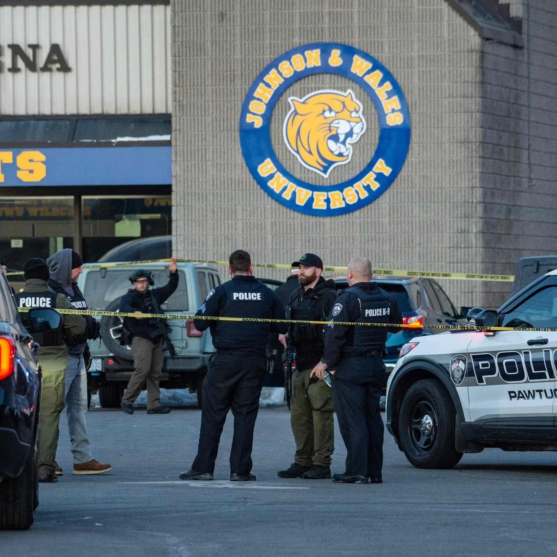 Police stand outside the perimeter around the Dennis M. Lynch Arena in Pawtucket, Rhode Island, on Feb 16.