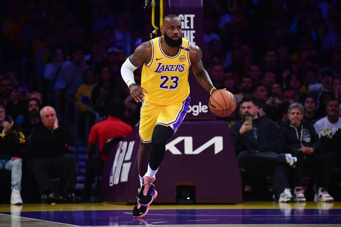 FILE PHOTO: Apr 30, 2025; Los Angeles, California, USA; Los Angeles Lakers forward LeBron James (23) brings the ball up court against the Minnesota Timberwolves during the first half in game five of first round for the 2025 NBA Playoffs at Crypto.com Arena. Gary A. Vasquez-Imagn Images/ File Photo