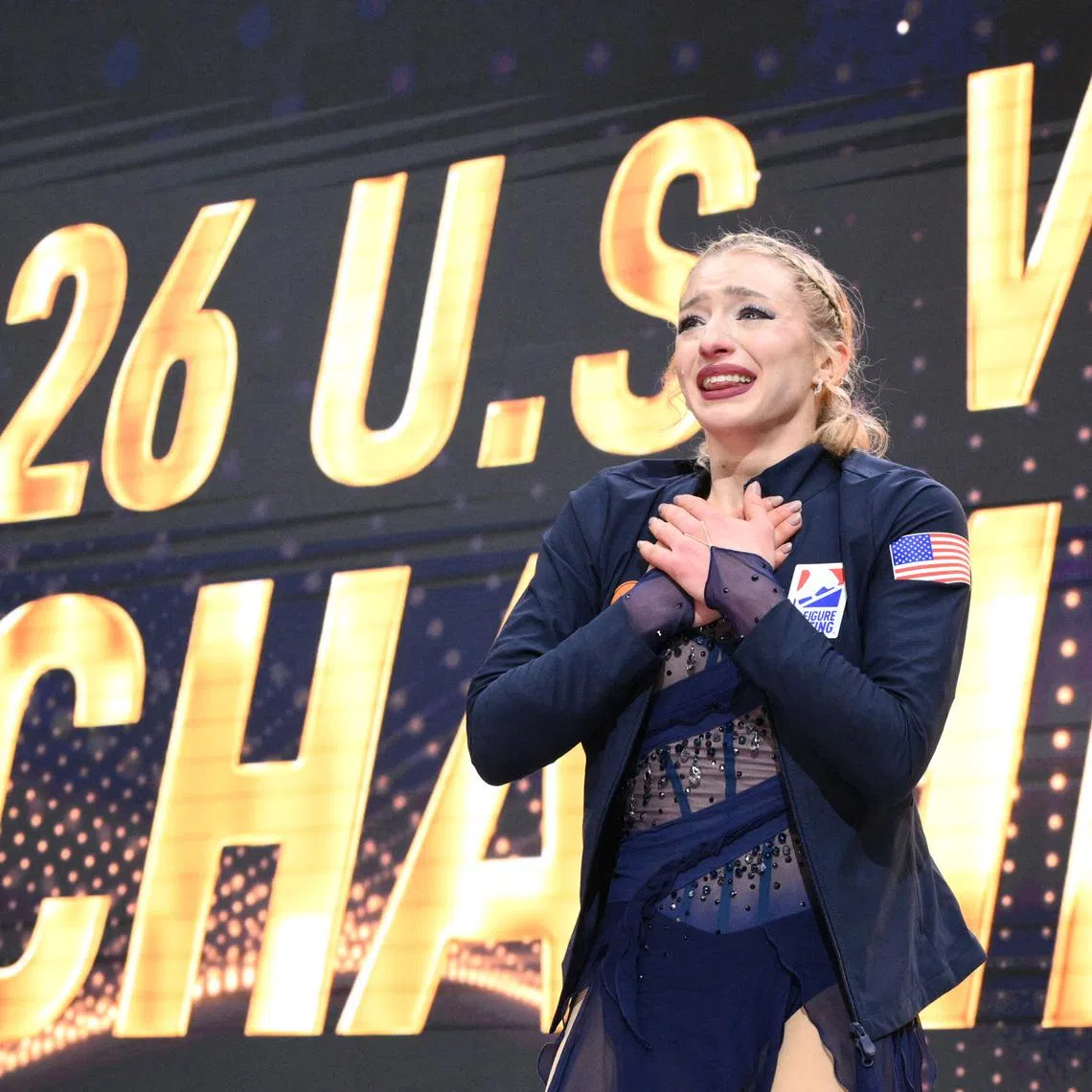 Jan 9, 2026; St. Louis, Missouri, UNITED STATES; Amber Glenn reacts after winning the championship womens free skate competition during the 2026 U.S. Figure Skating Championships at Enterprise Center. Mandatory Credit: Jeff Le-Imagn Images