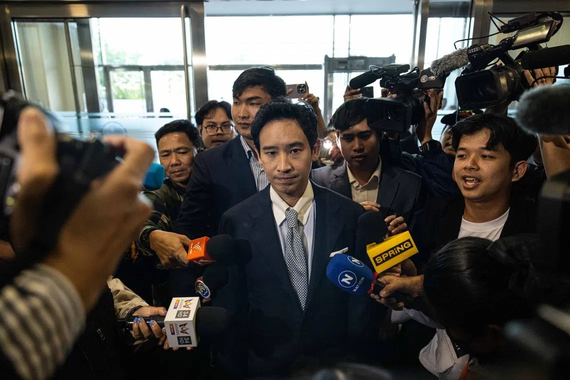 Pita Limjaroenrat, leader of the Move Forward Party, is seen outside the Constitutional Court in Bangkok, Thailand, on Aug 7.