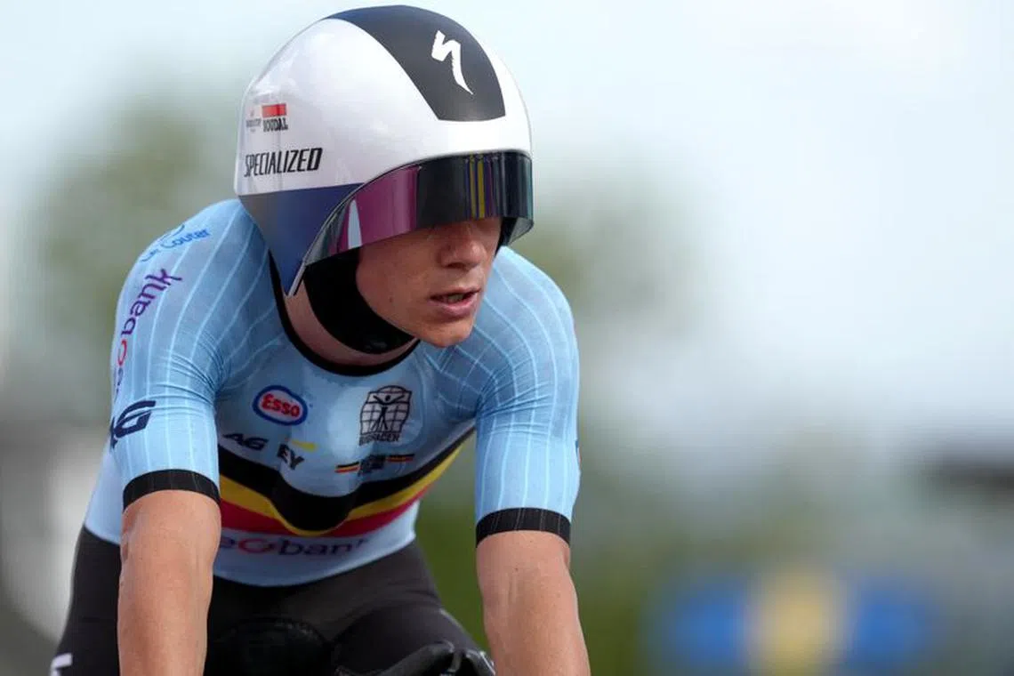 FILE PHOTO-Cycling - UCI World Championships 2023 - Stirling, Scotland, Britain - August 11, 2023 Belgium's Remco Evenepoel crosses the finish line during the Men's Elite Road Individual Time Trial REUTERS/Maja Smiejkowska/File Photo