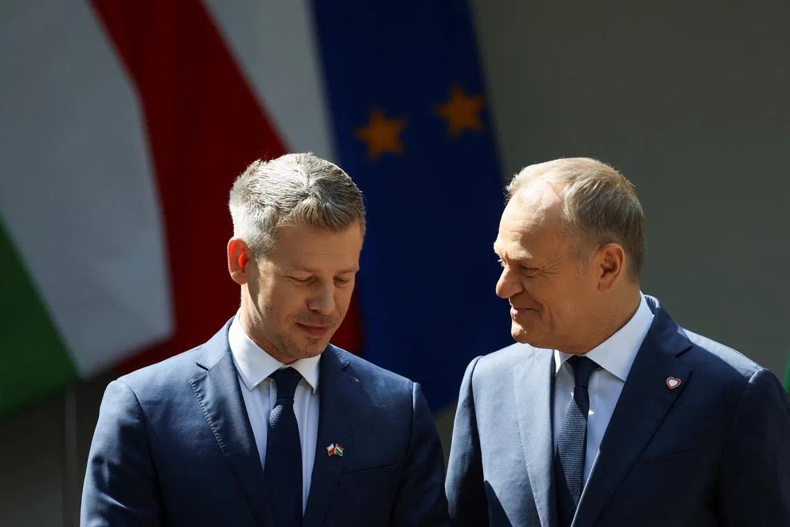 Poland's Prime Minister Donald Tusk meets with Hungarian Prime Minister Peter Magyar during his first official visit to the country, at the prime minister's residence in Warsaw, Poland, May 20, 2026. REUTERS/Kacper Pempel