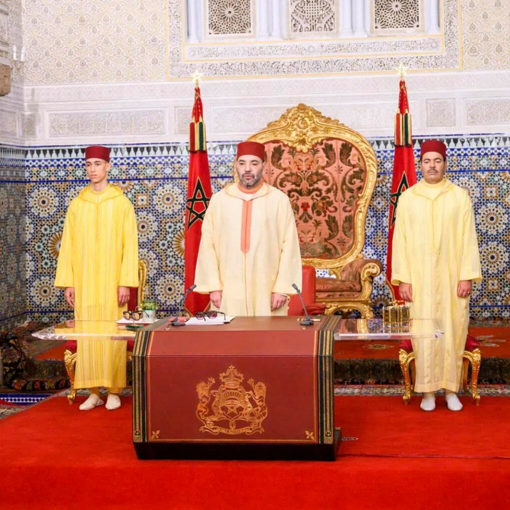Moroccan King Mohammed VI (centre) has confirmed the 1,055-kilometre (660 miles) expressway between Tiznit and the Western Sahara city of Dakhla will be called the Donald J. Trump Highwa