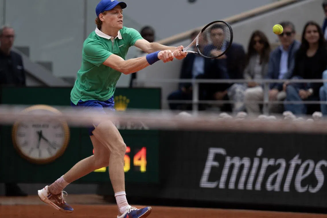 Jun 8, 2025; Paris, FR; Jannik Sinner of Italy returns a shot during the men’s singles final against Carlos Alcaraz of Spain on day 15 at Roland Garros Stadium. Mandatory Credit: Susan Mullane-Imagn Images/File Photo