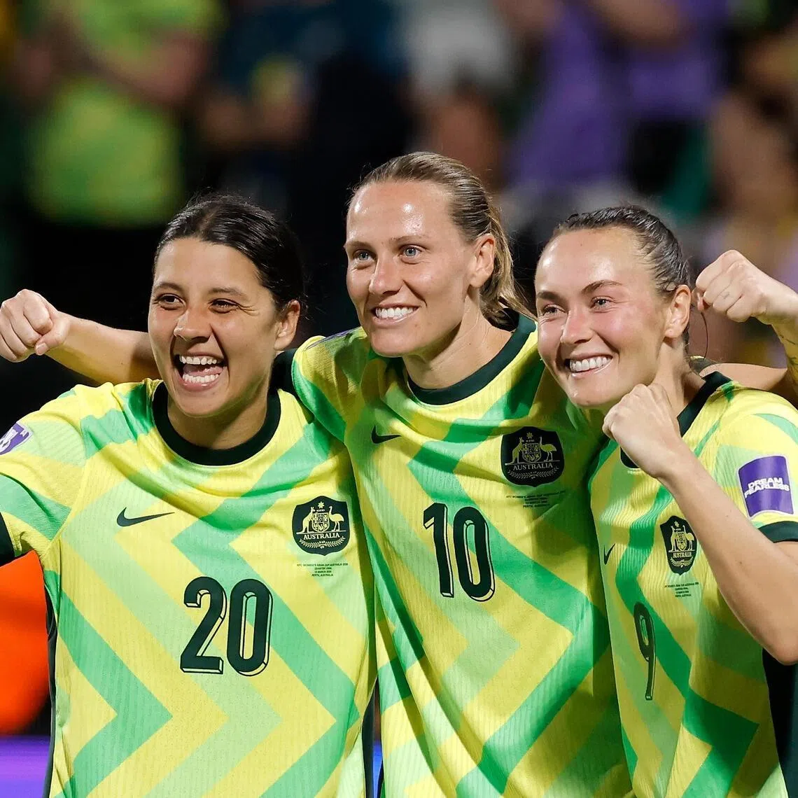 From left: Sam Kerr, Emily van Egmond and Caitlin Foord of Australia celebrating after the 2-1 Women’s Asian Cup quarter-final win over North Korea at Perth Rectangular Stadium on March 13, 2026.