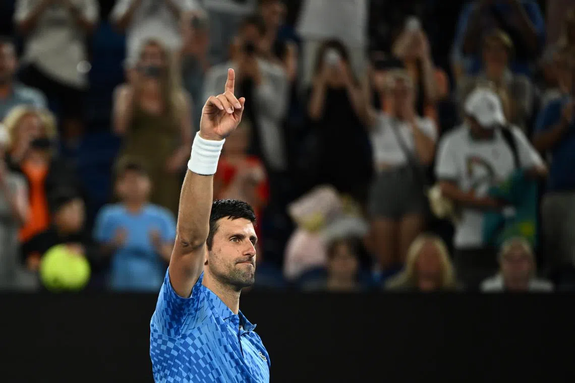 Novak Djokovic celebrates his win against Roberto Carballes Baena of Spain.