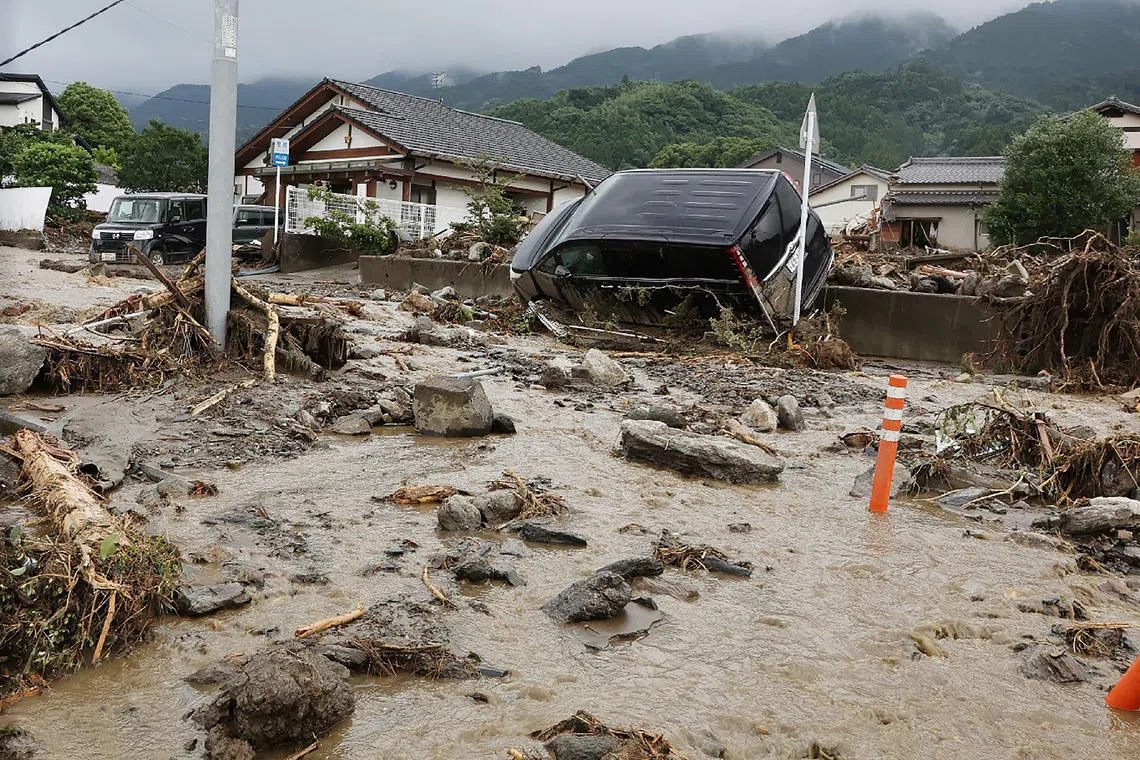 Debris following a flood in Kurume's Tanushimarumachi, Fukuoka prefecture, after heavy rains hit wide areas of Kyushu island.