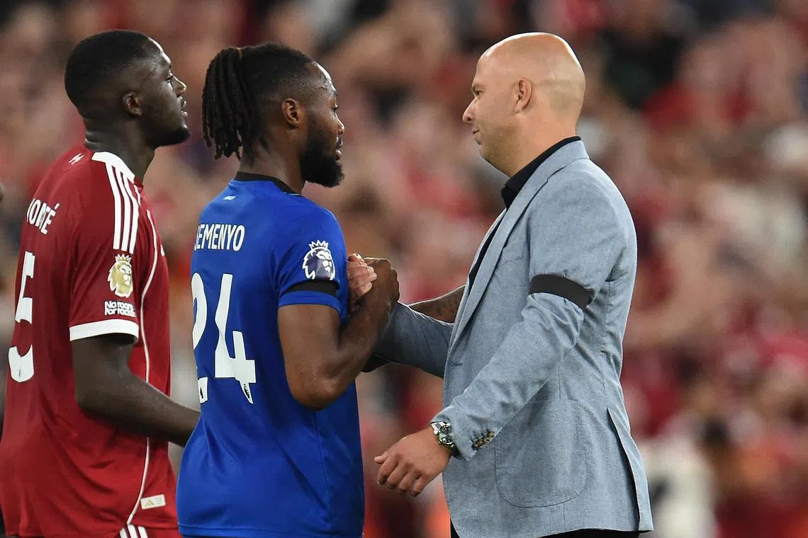 Liverpool manager Arne Slot shaking hands with Bournemouth's Antoine Semenyo after the match.