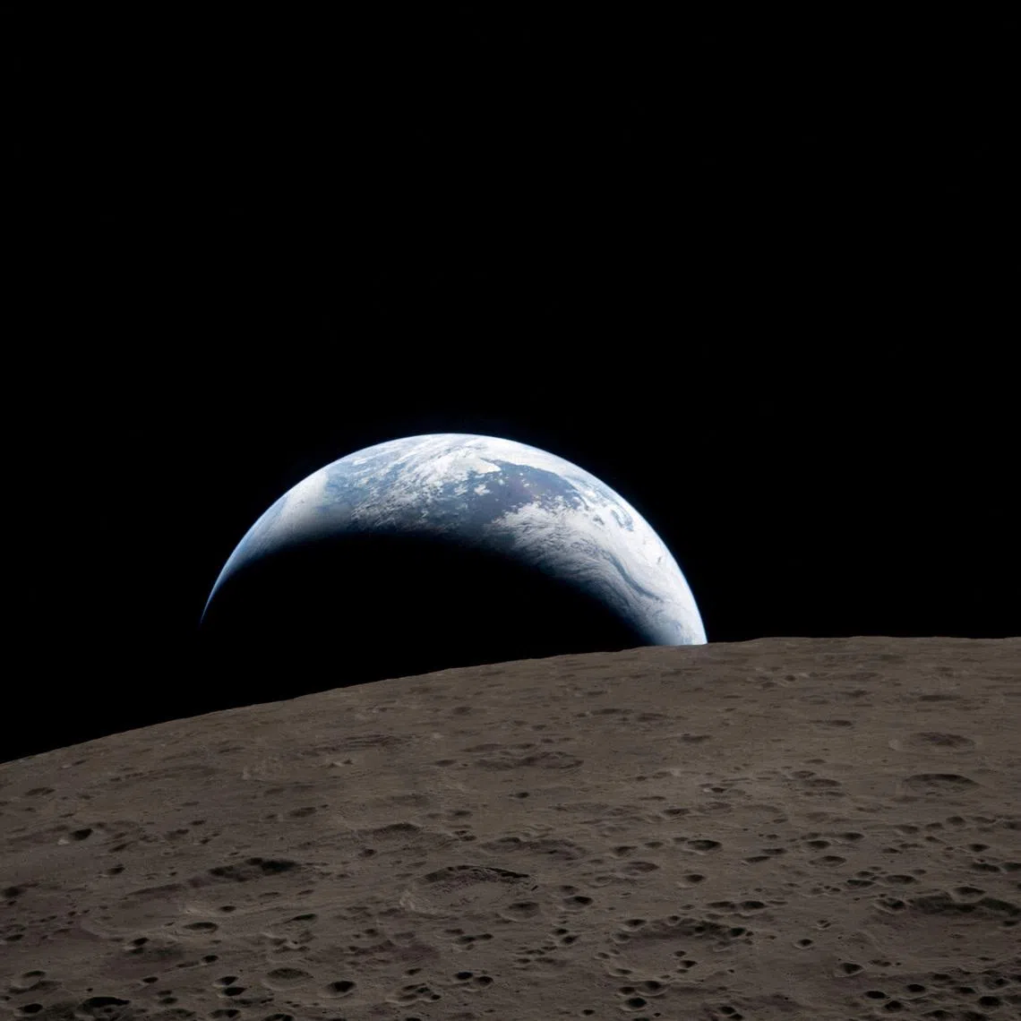 A view of Earth, partially hidden behind the Moon, from the Orion spacecraft on April 6. As AI creates demand for more of Earth’s resources, companies and governments are considering options for AI infrastructure in space.