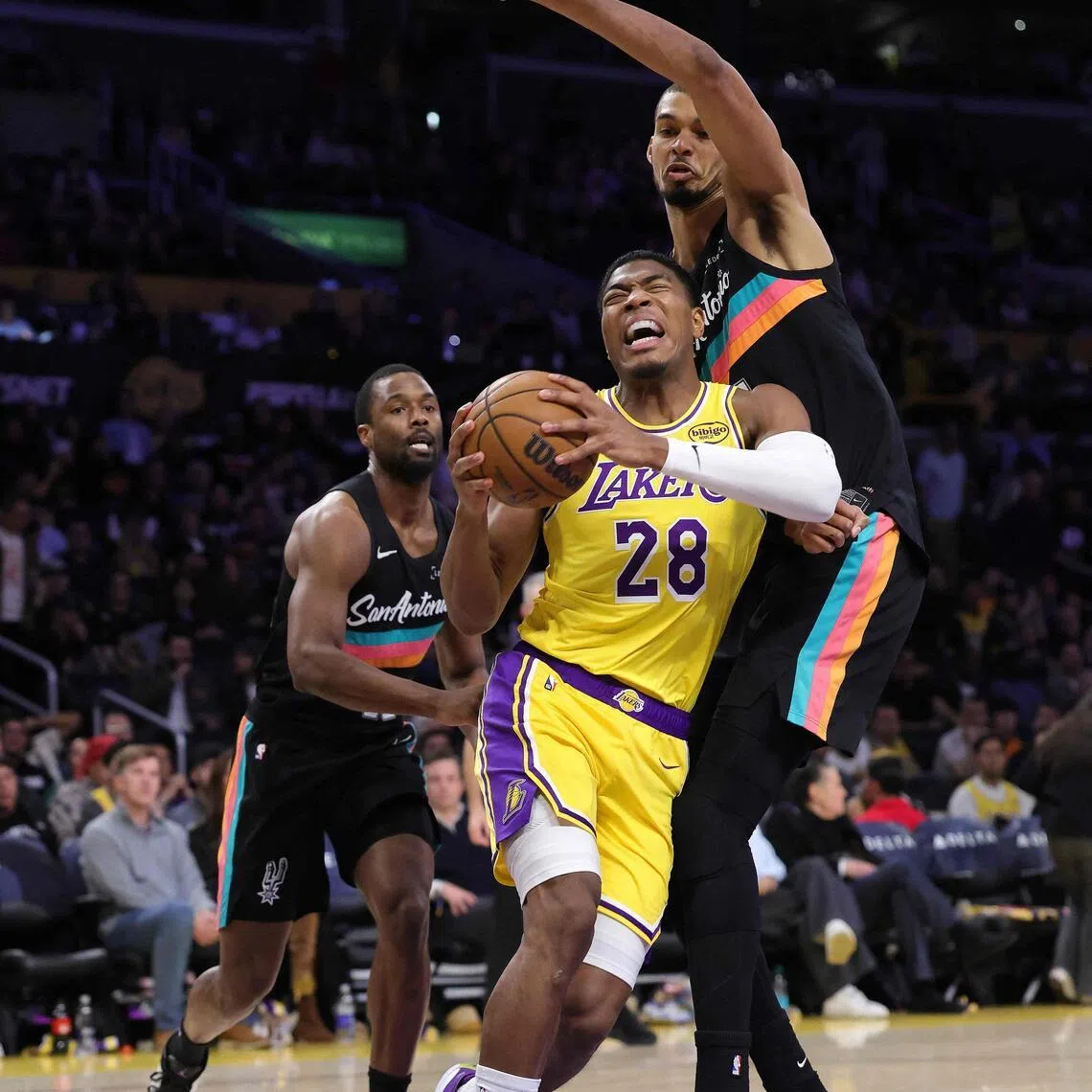 Rui Hachimura of the Los Angeles Lakers trying to fend off San Antonio Spurs' Victor Wembanyama during the Lakers' 136-108 home loss on Feb 10.
