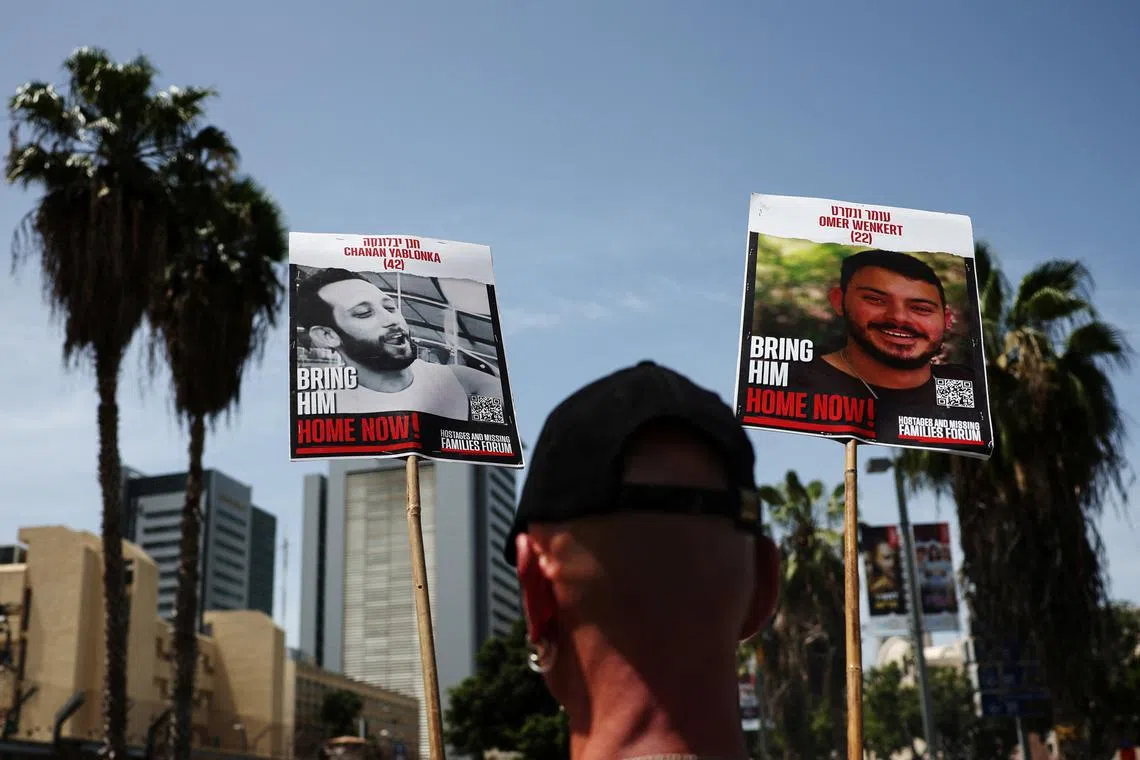 A person attends a protest as people call for the immediate release of Israeli hostages held in Gaza since the deadly October 7 attack on Israel by the Palestinian Islamist group Hamas, in Tel Aviv, Israel April 25, 2024. REUTERS/Shannon Stapleton/File Photo