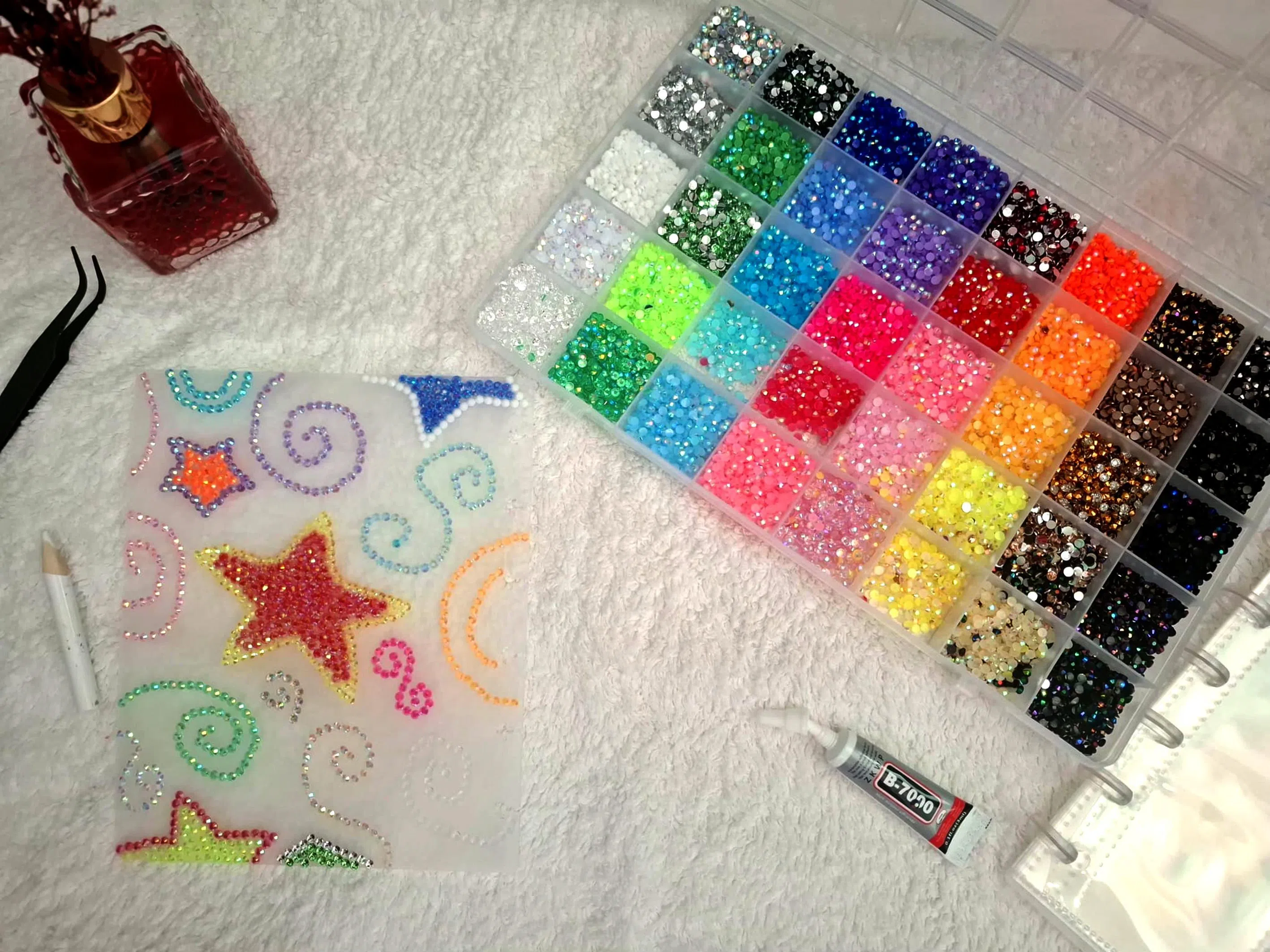 Zahira Jahan’s supplies – gems, rhinestones and tools – are purchased from Shopee, and she has spent about $17 on the hobby so far.