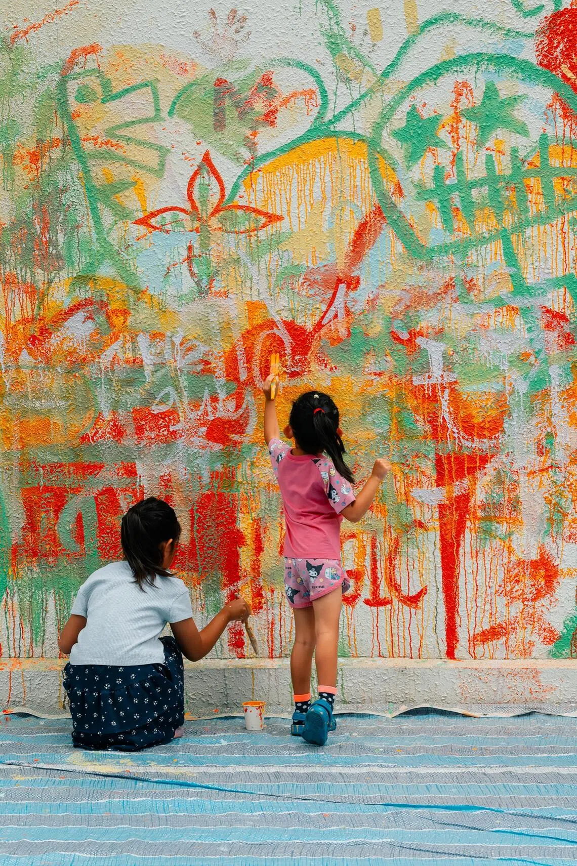 A community mural for free-spirited painting at the Reinvention: Allplay festival.