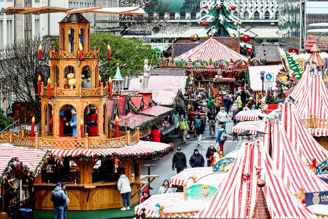 People visiting the Christmas Market in Magdeburg, Germany, on Nov 20.
