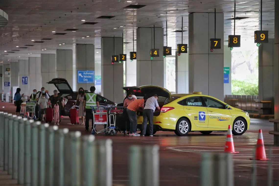Passengers seen boarding taxis at Changi Airport Terminal 3 arrival hall on June 24, 2022 around 11.45am.