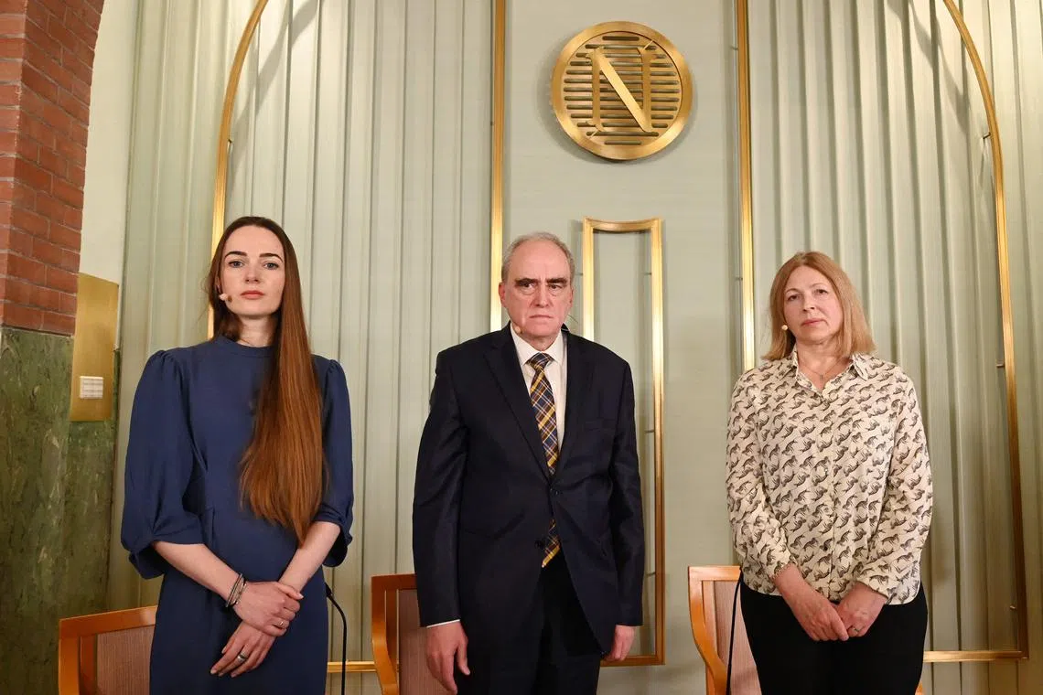 2022 Nobel Peace Prize winners (L-R) The Head of the Ukrainian Centre for Civil Liberties Oleksandra Matviichuk, the Chairman of the Russian human rights organisation Memorial Yan Rachinsky, and Natalia Pinchuk, wife of 2022 Nobel Peace Prize winner - jailed Belarusian activist Ales Bialiatski, pose for a photo after a press conference and ahead of the awarding ceremony at the Norwegian Nobel Institute in Oslo on Dec 9. 