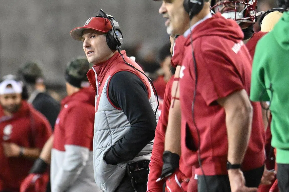 Nov 30, 2024; Pullman, Washington, USA; Washington State Cougars head coach Jake Dickert looks up at the video board during a game against the Wyoming Cowboys in the first half at Gesa Field at Martin Stadium. Mandatory Credit: James Snook-Imagn Images/ File Photo
