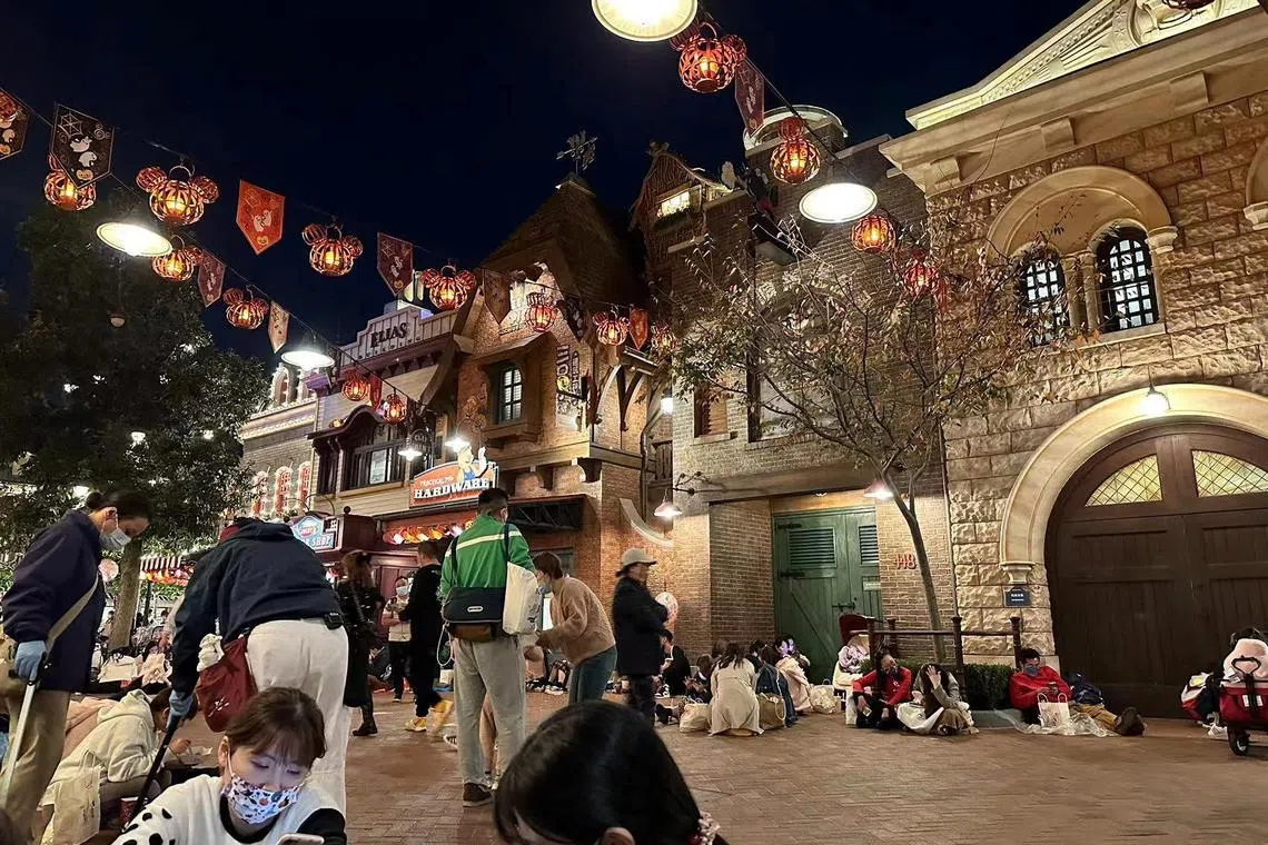 People sit inside the Shanghai Disney Resort amid the coronavirus disease outbreak on Oct 31, 2022.