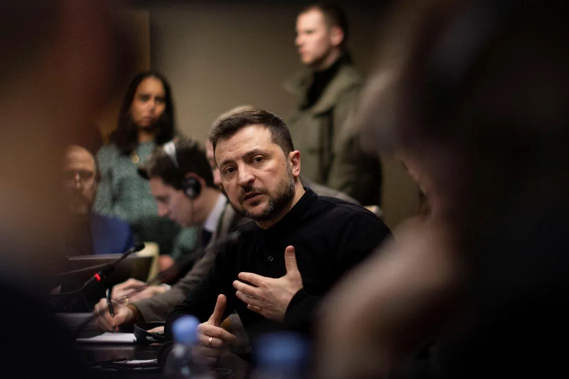 Ukrainian President Volodymyr Zelenskiy gestures during a meeting with members of the media on the outskirts of  London, Britain, March 2, 2025. REUTERS/Carlos Jasso/File Photo