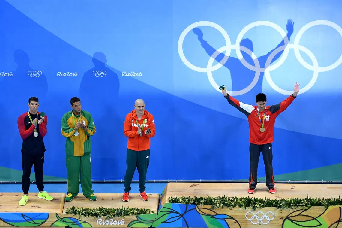 Joint silver medalists, Michael Phelps of United States, Chad Guy Bertrand le Clos of South Africa, Laszlo Cseh of Hungary and gold medalist Joseph Schooling of Singapore celebrate on the podium during the 2016 Olympic Games.