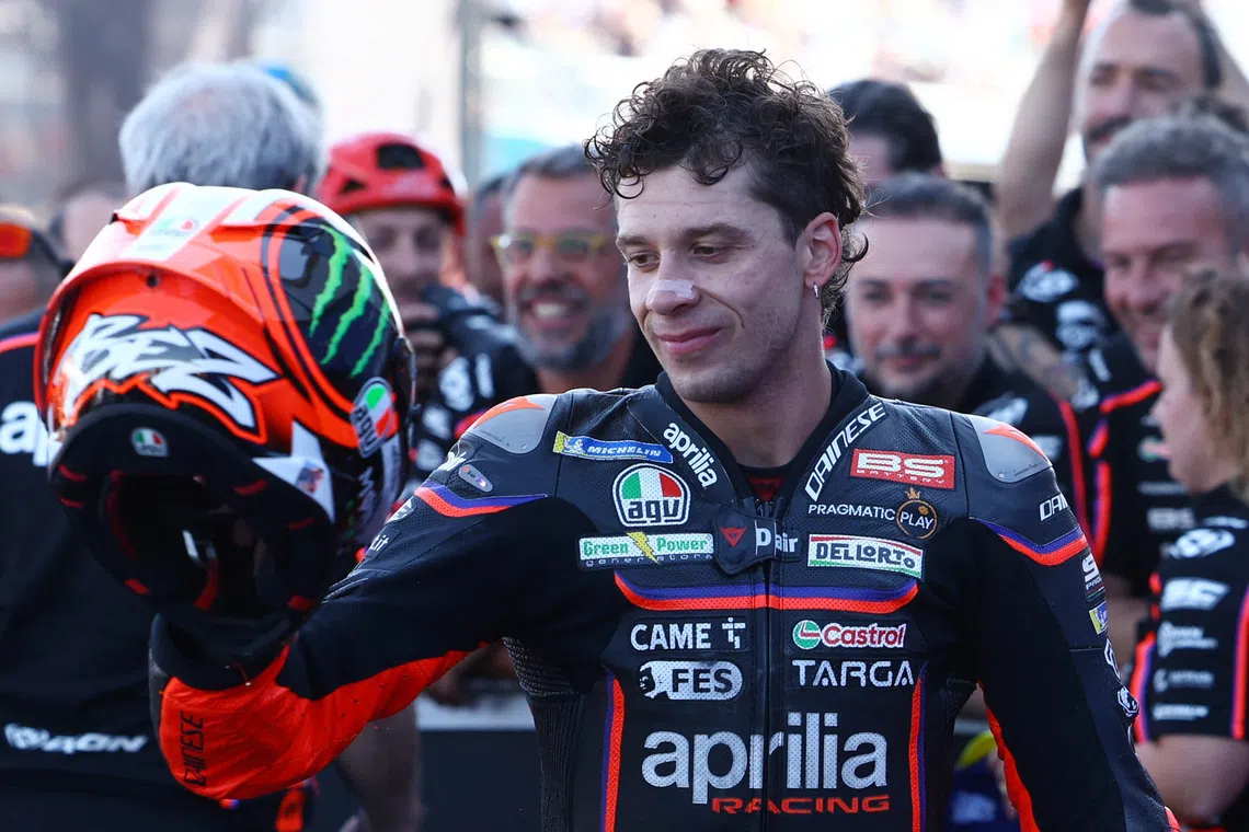 FILE PHOTO: MotoGP - Hungarian Grand Prix - Balaton Park Circuit, Balatonfokajart, Hungary - August 24, 2025 Aprilia Racing's Marco Bezzecchi celebrates finishing third in the MotoGP race REUTERS/Bernadett Szabo/File Photo