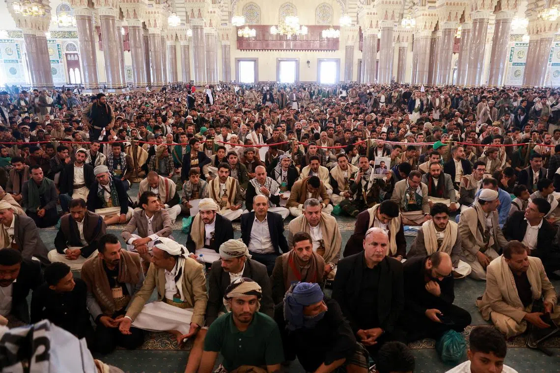 Mourners at the funeral procession of Houthi government officials killed in an Aug 28 Israeli strike, in Sanaa, Yemen, on Sept 1.