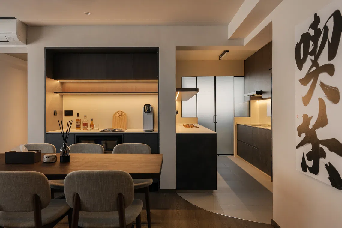 The pantry is located between the dining room and wet kitchen.  