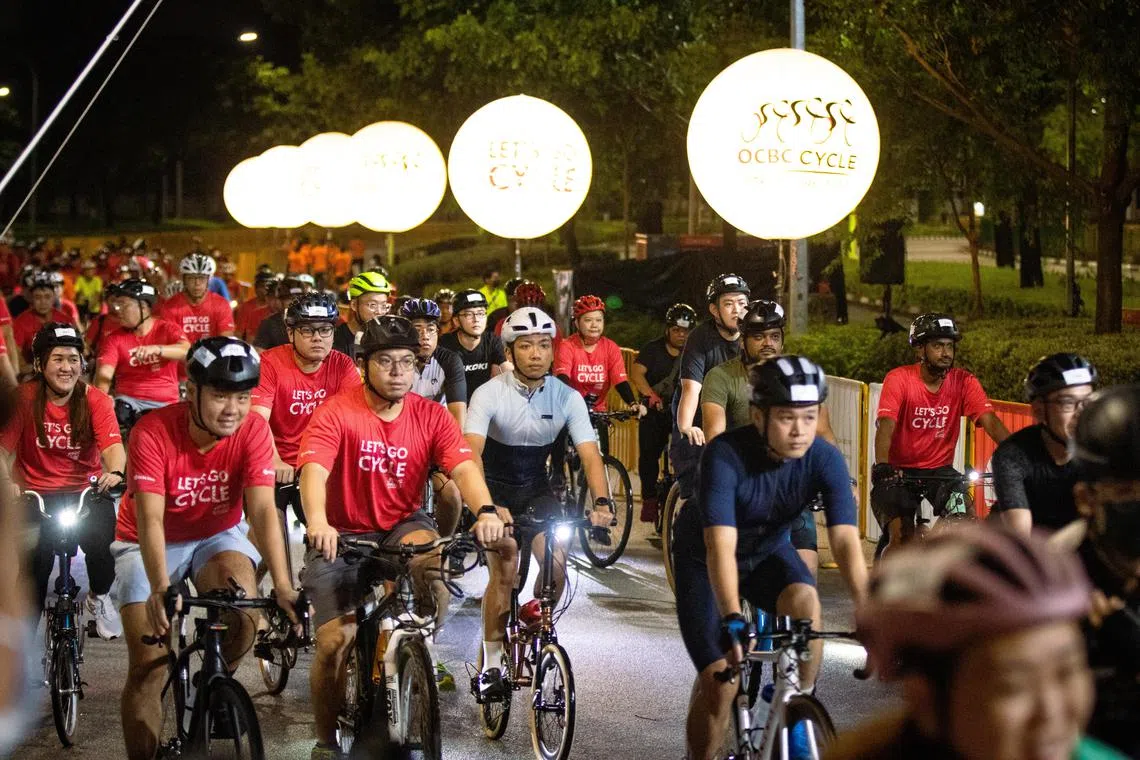 Participants at the start of the OCBC Cycle 2022 at the National Stadium.