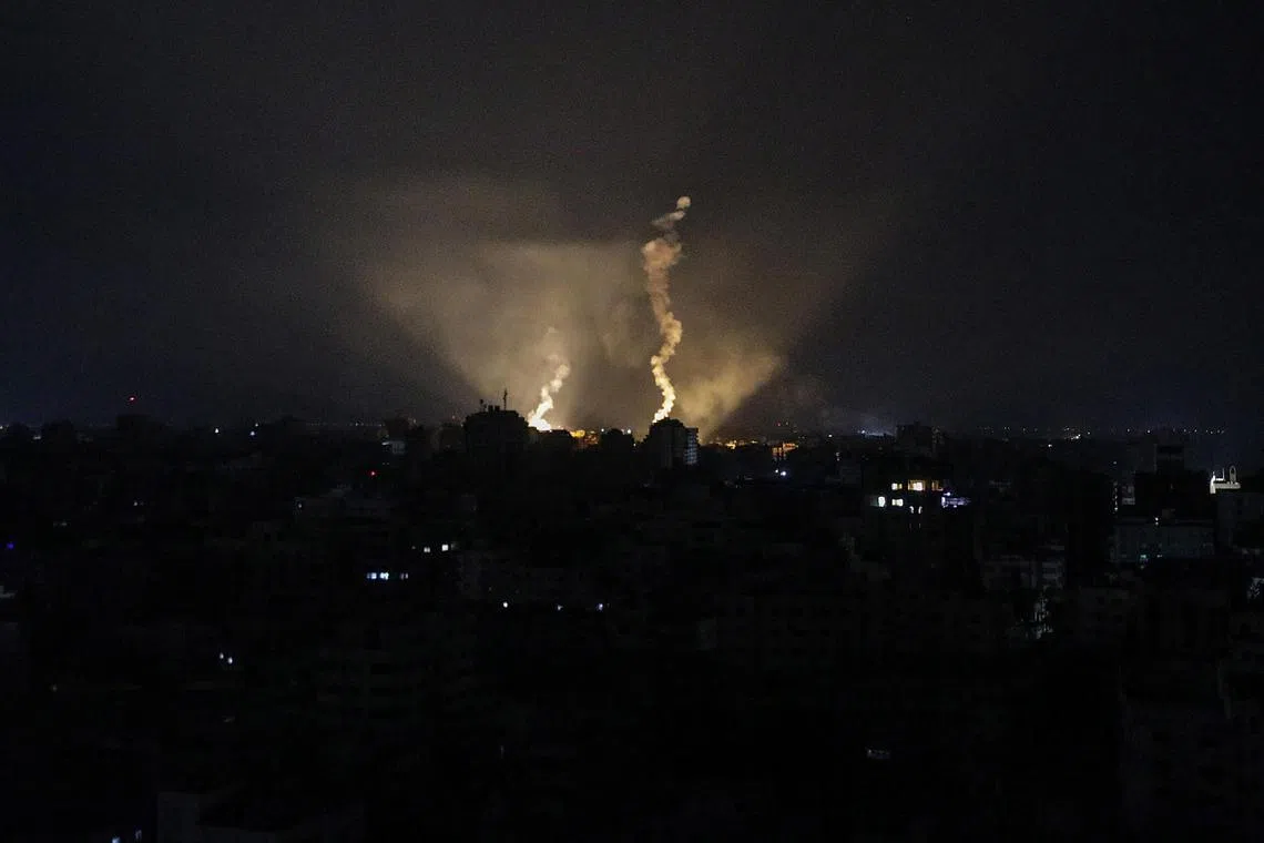 epaselect epa10933168 Israeli army flares illuminate the sky over Gaza City, 22 October 2023. More than 4,500 Palestinians and 1,400 Israelis have been killed, according to the Israel Defense Forces (IDF) and the Palestinian health authority, since Hamas militants launched an attack against Israel from the Gaza Strip on 07 October. After 20 aid trucks were allowed into the Gaza strip on 21 October through the Rafah border crossing with Egypt, 17 more were allowed in on 22 October.  EPA-EFE/MOHAMMED SABER