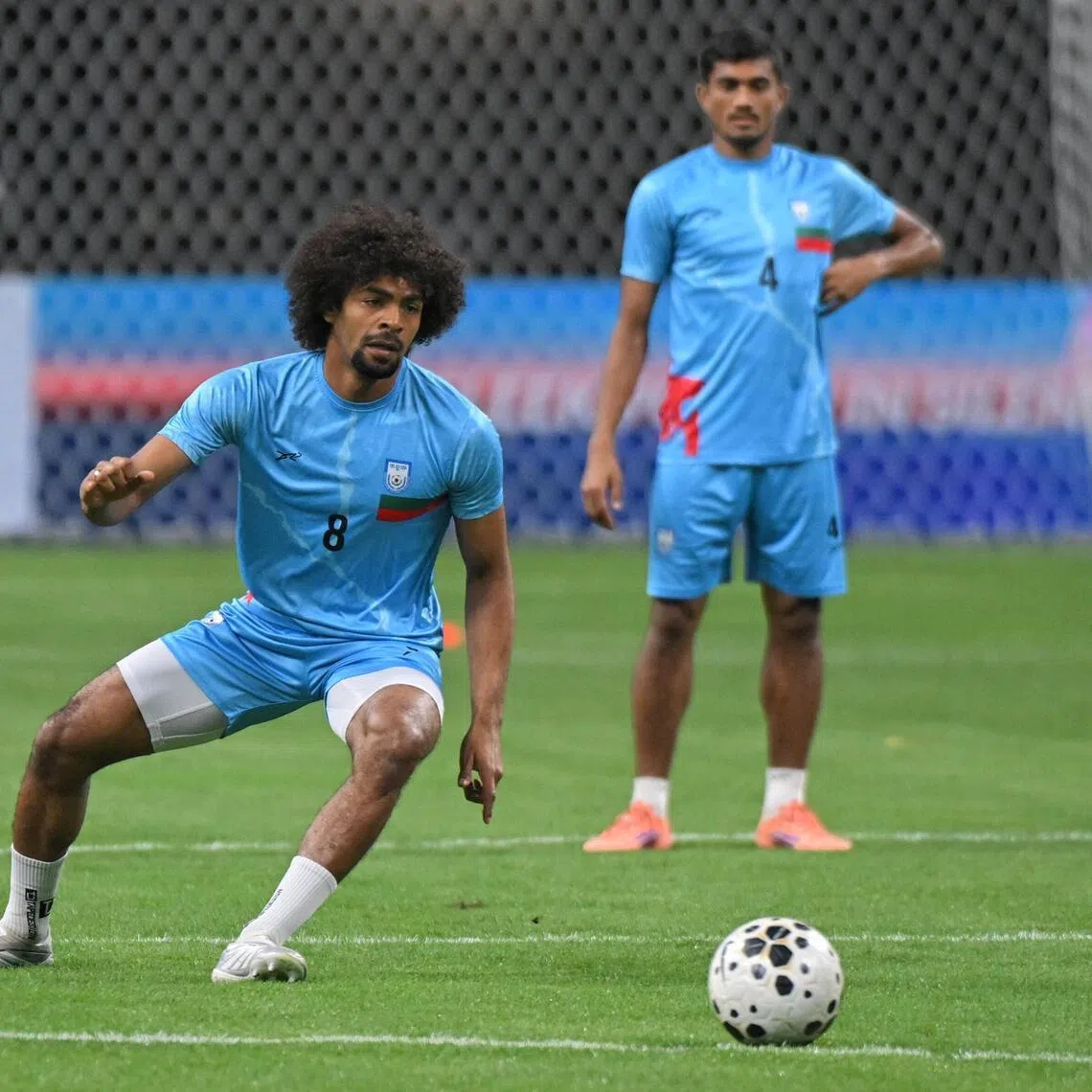Bangladesh footballer Hamza Choudhury (left) in action during a training session ahead of the Asian Cup qualifier against Singapore on March 31, 2026.