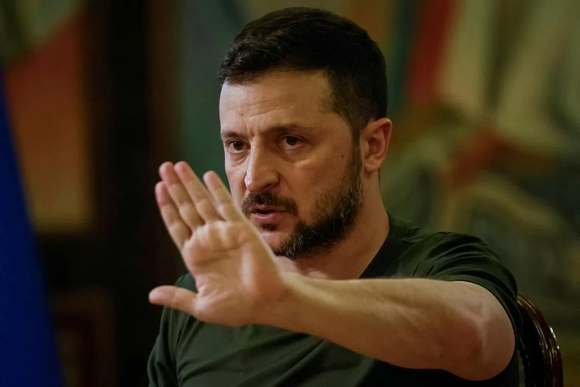 FILE PHOTO: Ukraine's President Volodymyr Zelenskiy speaks during an interview with Reuters, amid Russia's attack on Ukraine, in Kyiv, Ukraine May 20, 2024. REUTERS/Gleb Garanich/File Photo