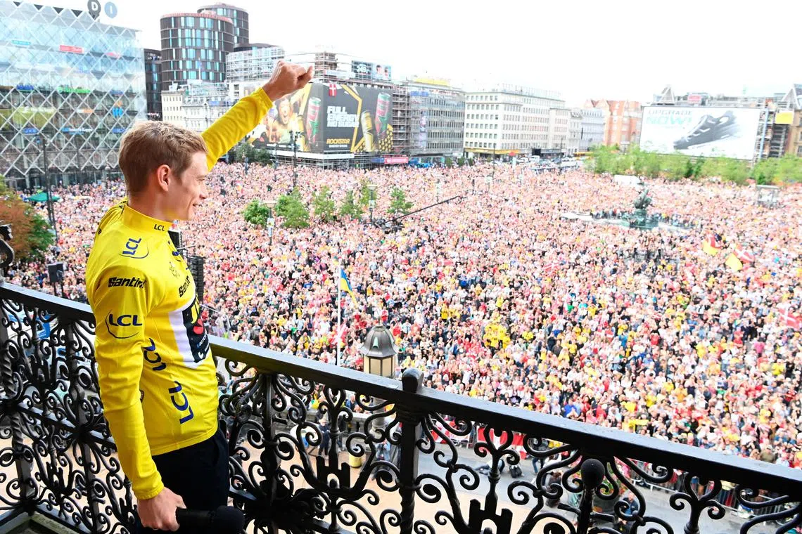 Cycling - Team Jumbo–Visma's Jonas Vingegaard arrives in Denmark after winning the 110th Tour De France - Copenhagen, Denmark - July 26, 2023
Team Jumbo–Visma's Jonas Vingegaard akcnowledges fans during the celebration from the city hall in Copenhagen
Olafur Steinar Gestsson/Ritzau Scanpix via REUTERS

ATTENTION EDITORS - THIS IMAGE WAS PROVIDED BY A THIRD PARTY. DENMARK OUT. NO COMMERCIAL OR EDITORIAL SALES IN DENMARK.
