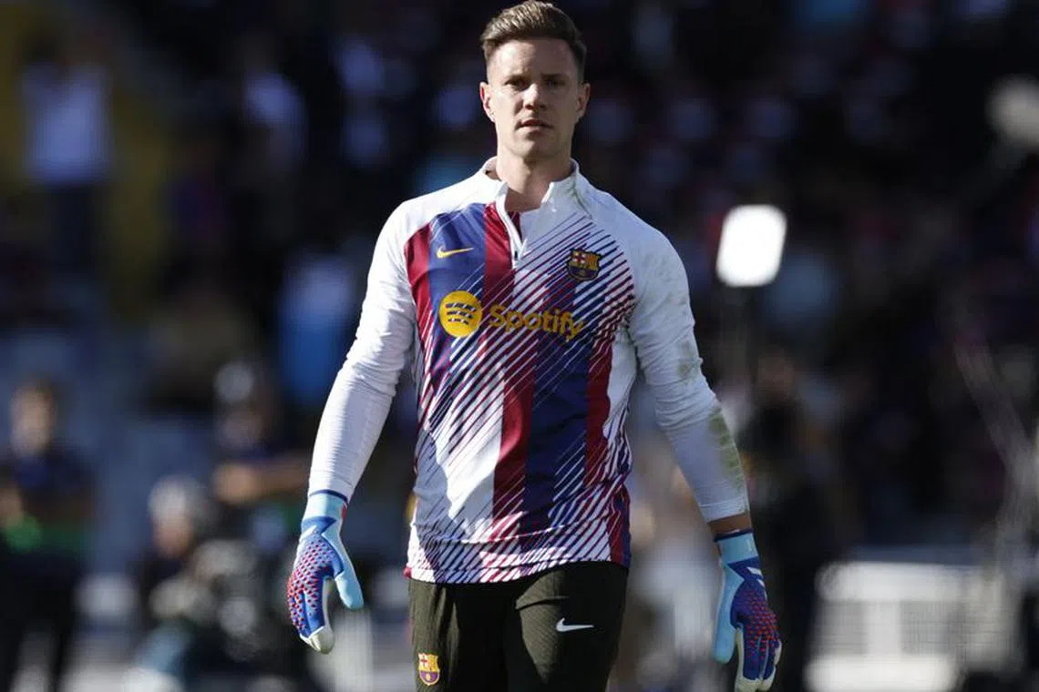 FILE PHOTO: Soccer Football - LaLiga - FC Barcelona v Real Madrid - Estadi Olimpic Lluis Companys, Barcelona, Spain - October 28, 2023 FC Barcelona's Marc-Andre ter Stegen during the warm up before the match REUTERS/Albert Gea/File Photo