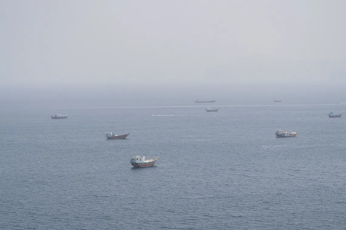 Vessels near the Strait of Hormuz, as seen from Musandam, Oman, on Sept 2.