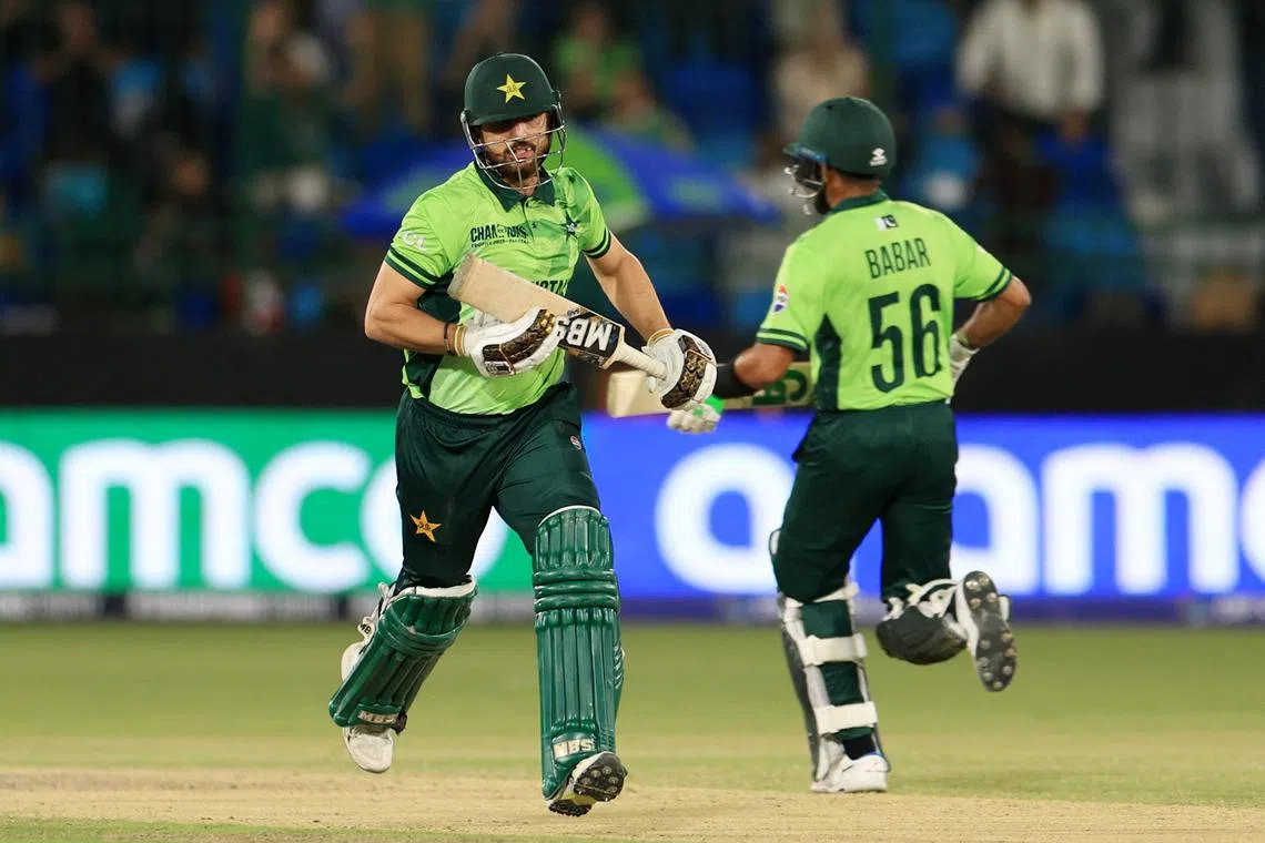 Cricket - ICC Men's Champions Trophy - Group A - Pakistan v New Zealand - National Stadium, Karachi, Pakistan - February 19, 2025 Pakistan's Salman Ali Agha and Babar Azam in action running between the wickets REUTERS/Akhtar Soomro/ File Photo