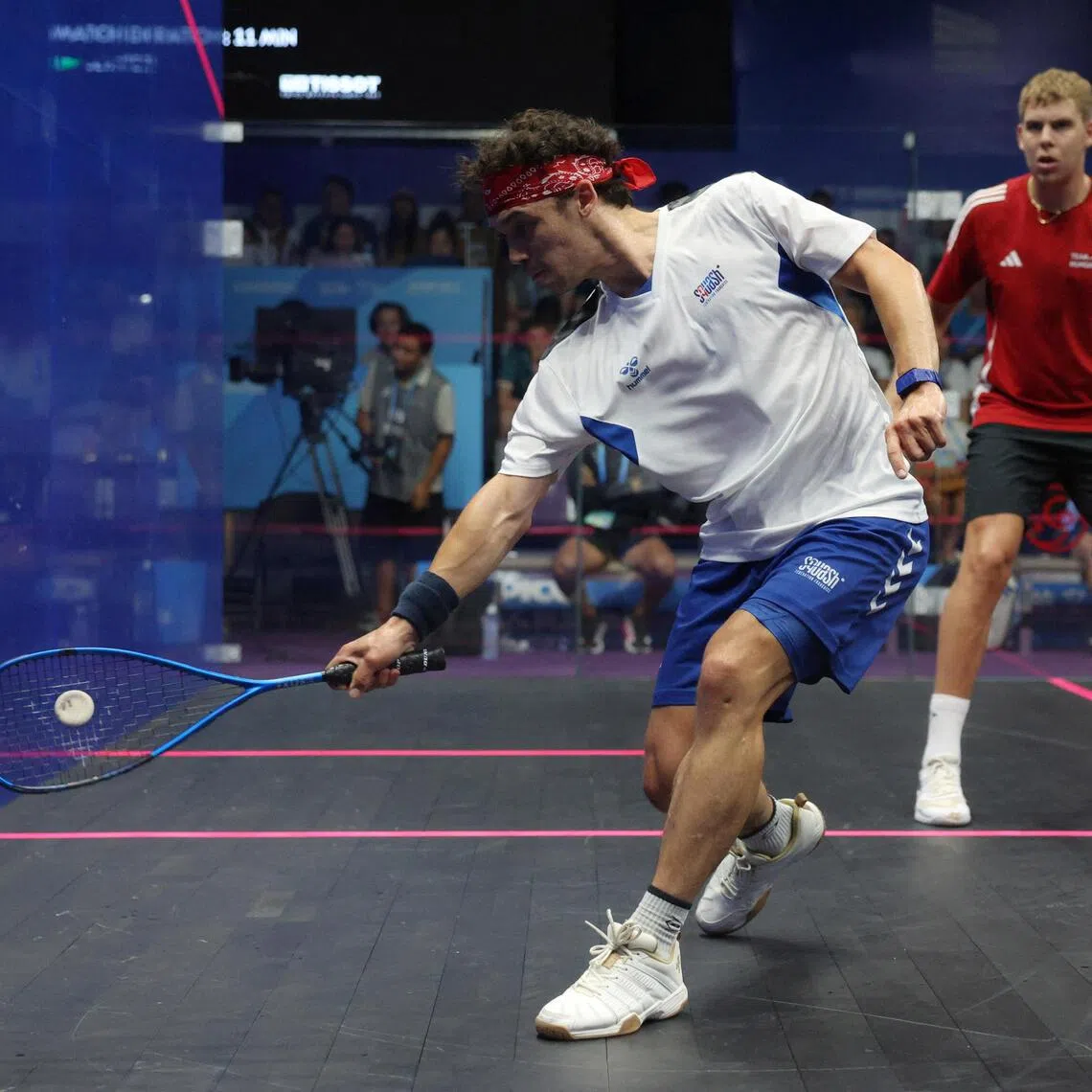 Eventual champion Victor Crouin (left) taking on Hungary's Balazs Farkas in the final of the men's singles squash event at the World Games in Chengdu in August.
