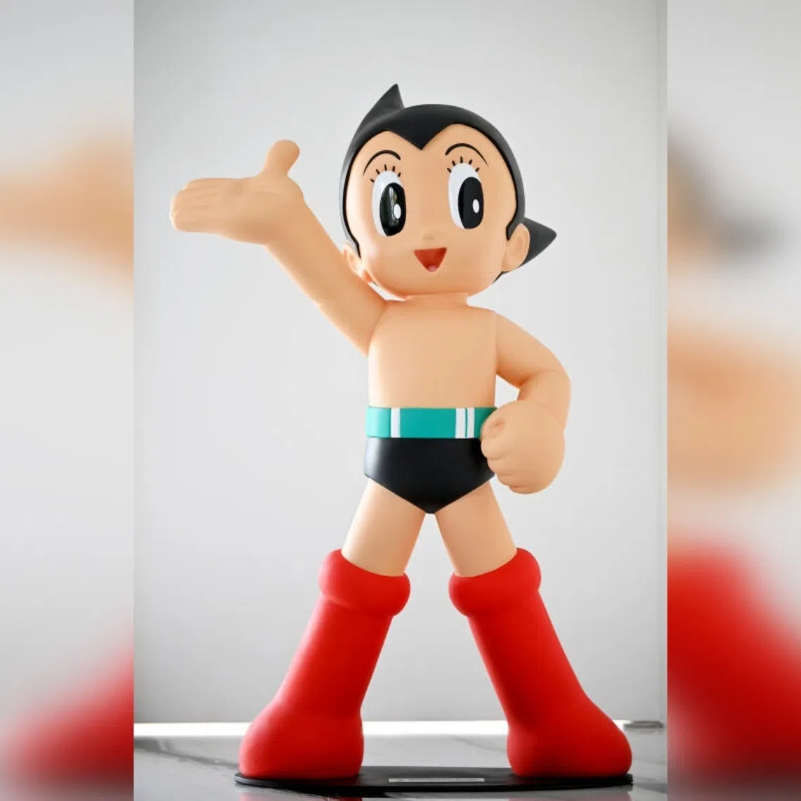 Astro Boy, a cute and friendly robot, reflects the more benign view Asian societies have of AI and technology compared with the West, says the writer.