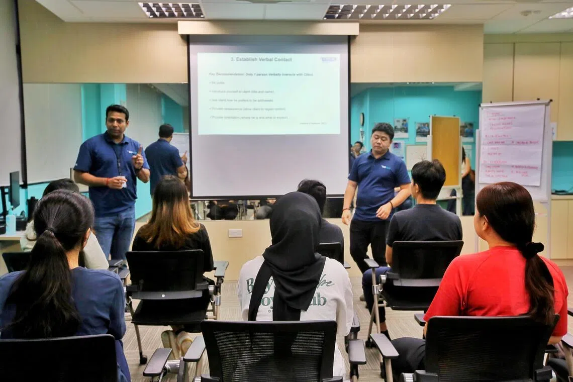 IMH assistant director of nursing Kalaivanan Dakshnamoorthy (left) and senior nurse manager Win Min Htet (right) structured the Code Grey training programme with tutorial-style lessons and sharing of real-life experiences by senior nursing leaders.