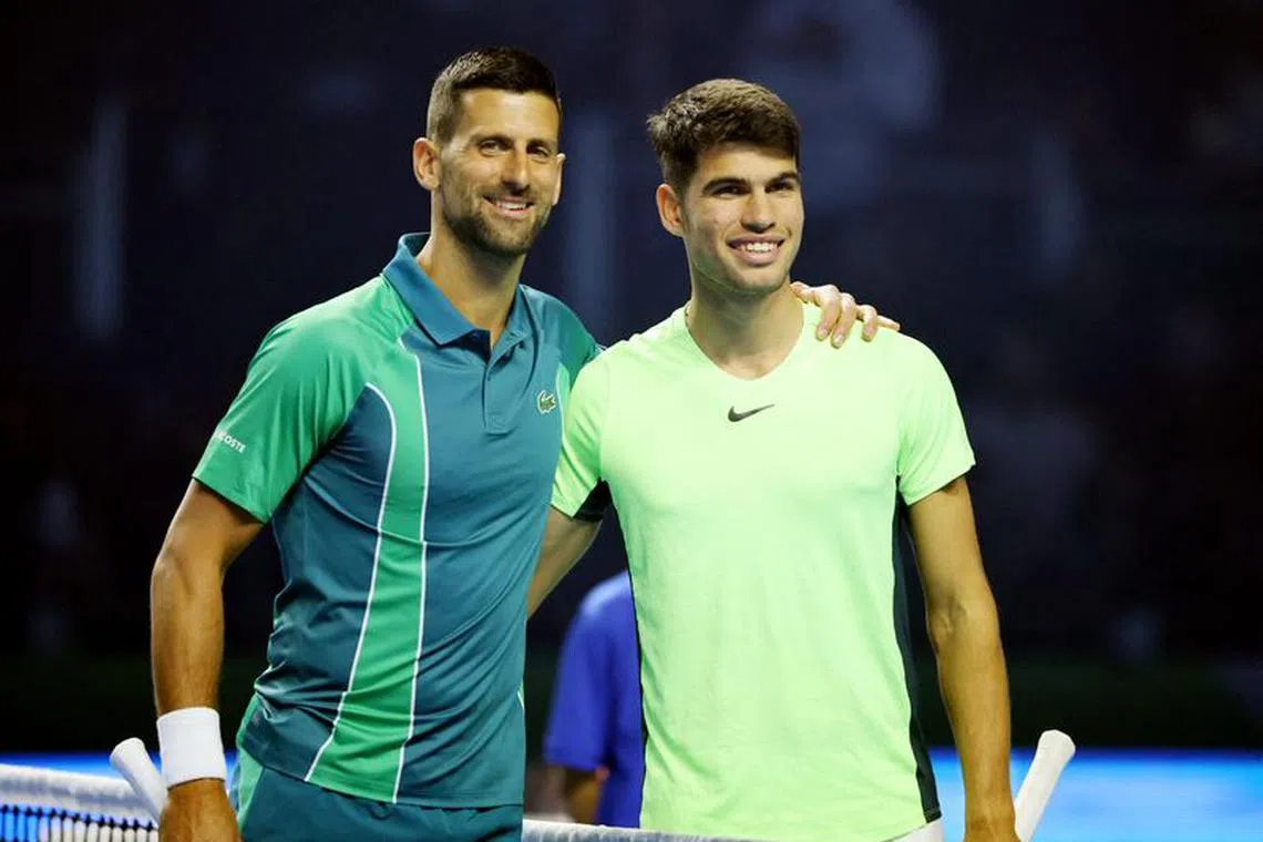 FILE PHOTO: Tennis - Exhibition Match - Novak Djokovic v Carlos Alcaraz - Riyadh, Saudi Arabia - December 27, 2023 Serbia's Novak Djokovic and Spain's Carlos Alcaraz before their match REUTERS/Ahmed Yosri/File Photo