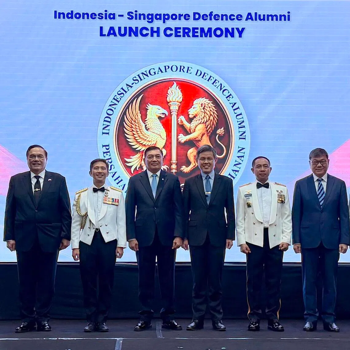 Defence Minister Chan Chun Sing (fourth from right) and his Indonesian counterpart Sjafrie Sjamsoeddin (fourth from left) at the launch of the Indonesia-Singapore Defence Alumni initiative in Jakarta.