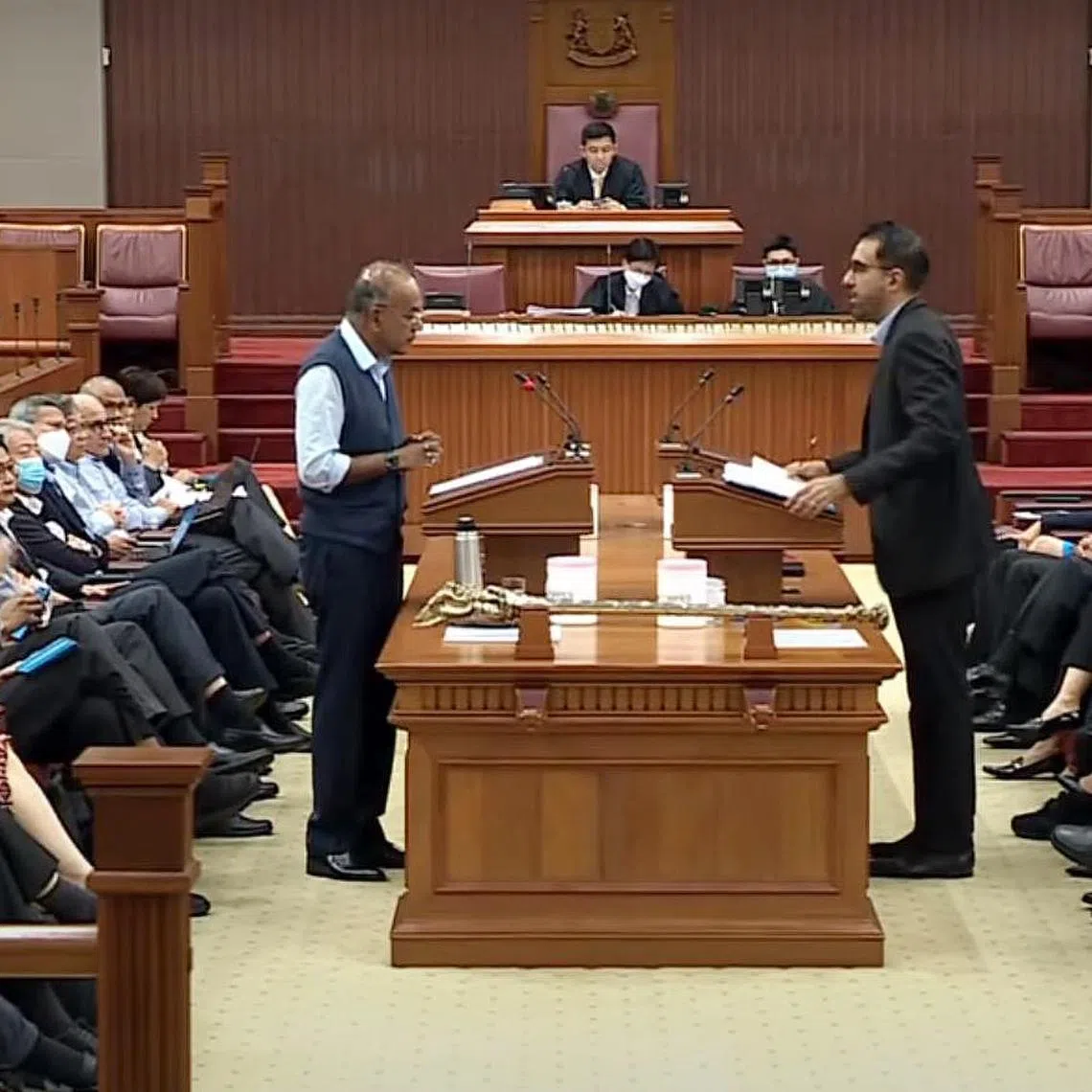 Minister for Home Affairs and Law K. Shanmugam (left) and Leader of the Opposition Pritam Singh speaking in Parliament on Nov 29, 2022.