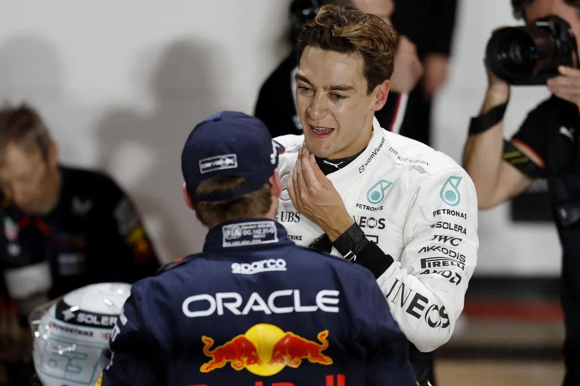 Mercedes' George Russell (right) and Red Bull's Max Verstappen talking after the qualifying session in Qatar.
