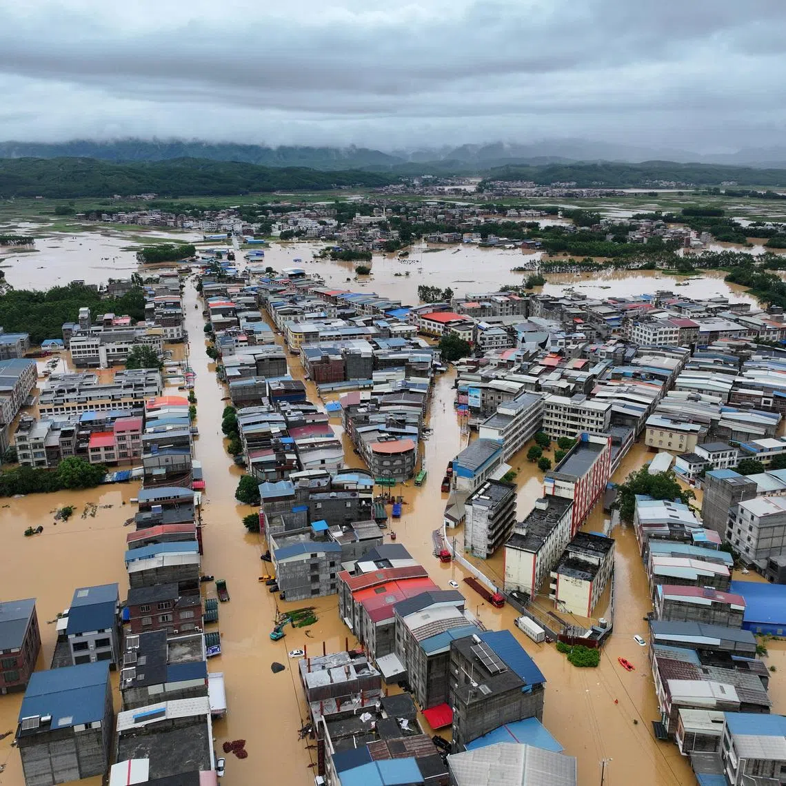Flooding in Pingshan village, in Nanning’s Hengzhou, after heavy rainfall brought by Typhoon Maysak on July 6.