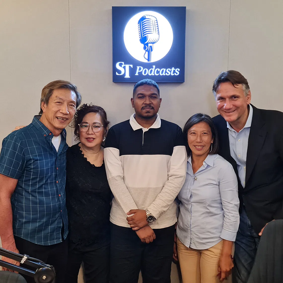 (From left) Parents of kayaker Stephenie Chen, Michael Chen and Sarah-Yvonne, ST Sports reporter Deepanraj Ganesan, parents of kitefoiler Maximilian Maeder, Hwee Keng and Valentin Maeder.
