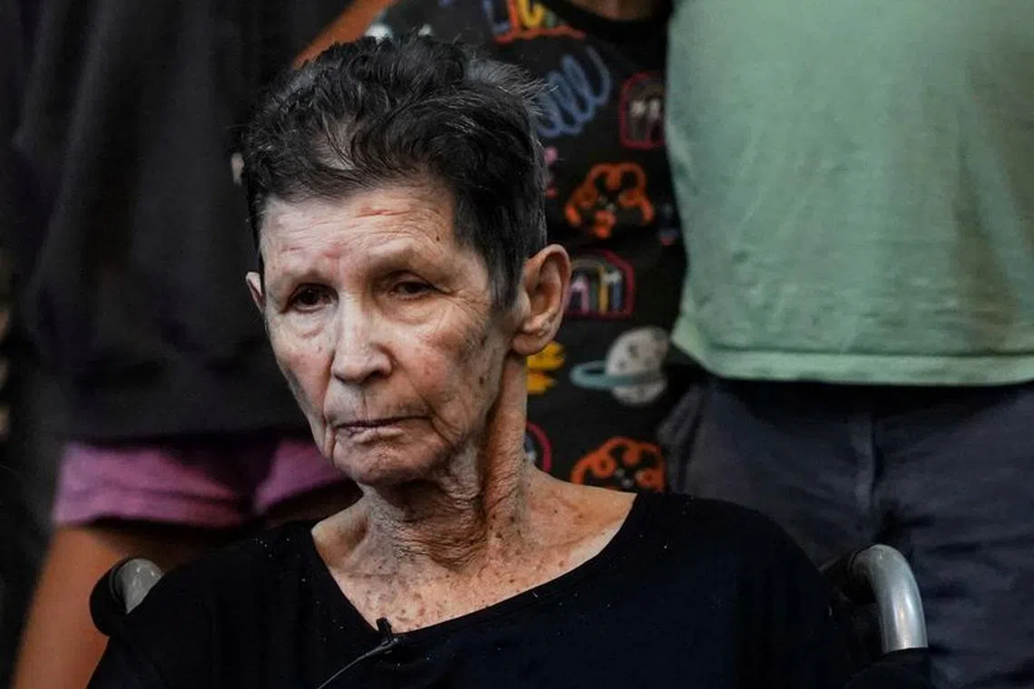 FILE PHOTO: Yocheved Lifshitz, 85, an Israeli grandmother who was held hostage in Gaza looks on after being released by Hamas militants, at Ichilov Hospital in Tel Aviv, Israel October 24, 2023. REUTERS/Janis Laizans/File Photo