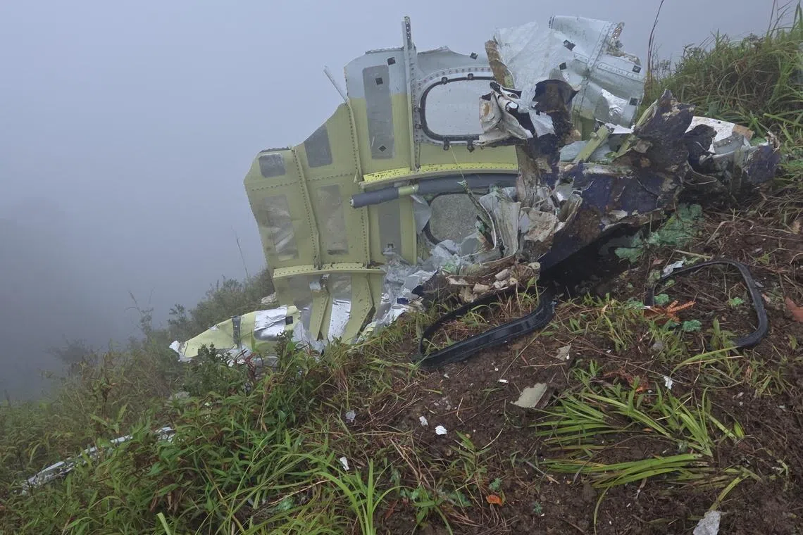 Indonesian authorities find wreckage of  plane that was carrying 11 people