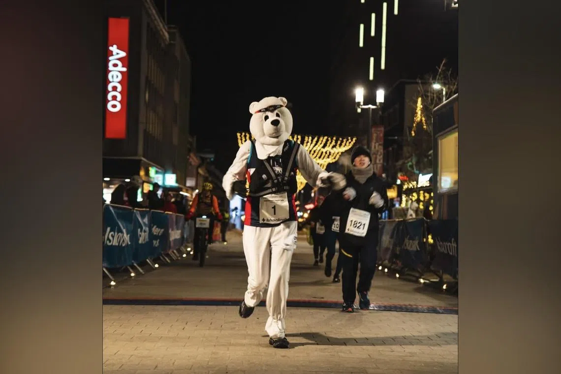 Ms Gill Punt set a Guinness World Record after completing the PolarNight Marathon in Norway on Jan 4 dressed as a polar bear. 