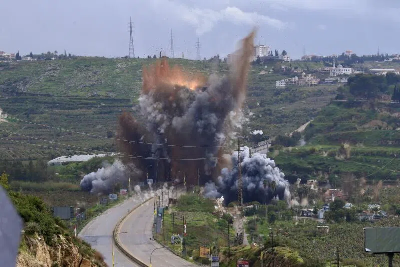 epa12841453 Smoke and flames rise after an Israeli strike targeting the Qasmiya Bridge near Tyre, in southern Lebanon, 22 March 2026. According to the Lebanese National News Agency (NNA), the Israeli military carried out an airstrike on the Qasmiya Bridge, a key crossing point over the Litani River connecting southern Lebanon to the north. EPA/STRINGER