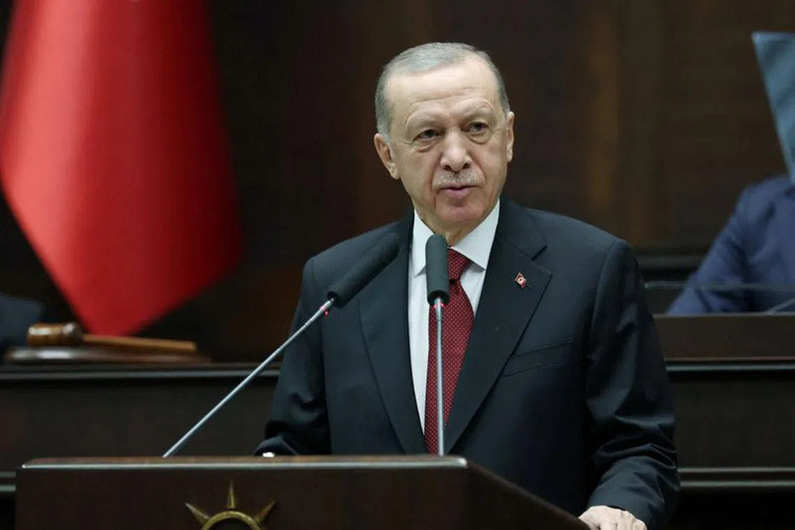 FILE PHOTO: Turkey's President Tayyip Erdogan addresses lawmakers from his ruling AK Party at the Turkish Parliament in Ankara, Turkey October 11, 2023. Presidential Press Office/Handout via REUTERS ATTENTION EDITORS - THIS PICTURE WAS PROVIDED BY A THIRD PARTY. NO RESALES. NO ARCHIVES./File Photo
